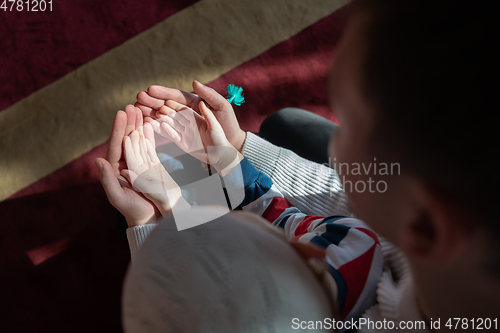 Image of muslim prayer father and son in mosque prayingtogether