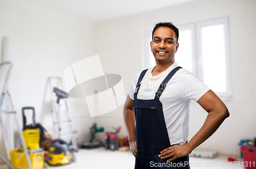 Image of happy smiling indian worker or builder