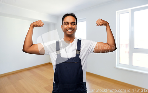 Image of indian builder showing his power at new home