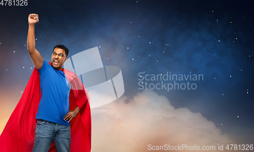 Image of indian man in superhero cape over night sky