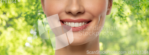 Image of close up of beautiful young woman with white smile