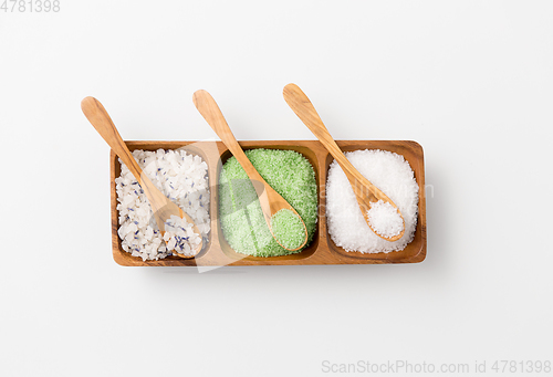 Image of sea salt and spoons on wooden tray