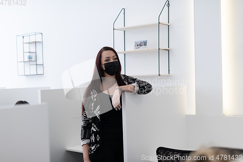 Image of business woman portrait in medical protective mask