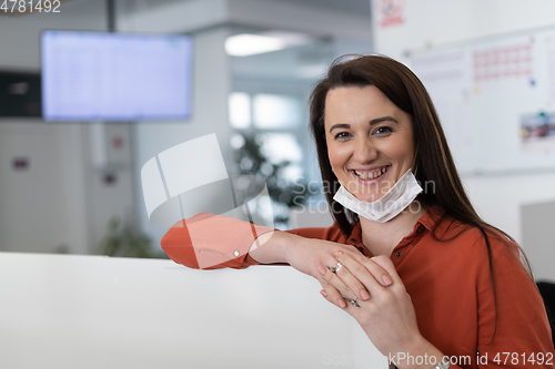 Image of business woman portrait in medical protective mask