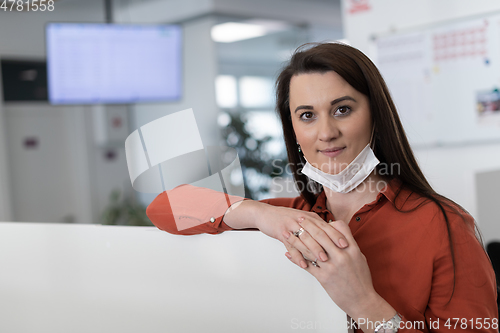 Image of business woman portrait in medical protective mask