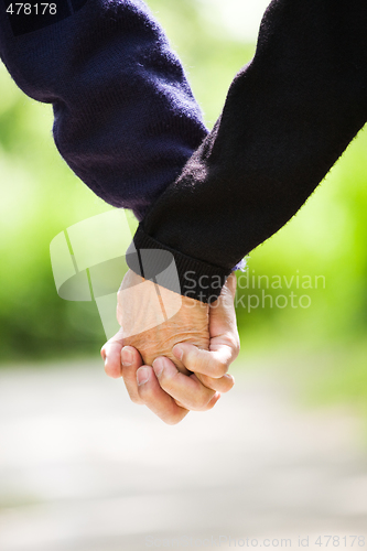 Image of Senior holding hands