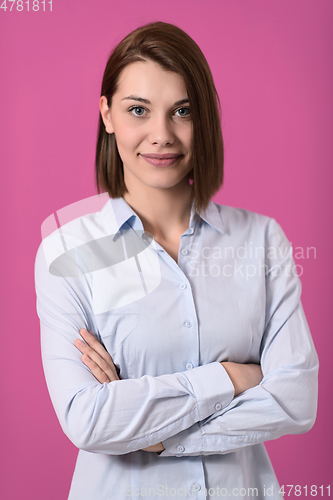 Image of Portrati shot of beautiful blond businesswoman standing with arms crossed at isolated white background.