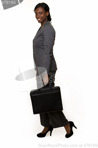 Image of Business woman in grey pant suit