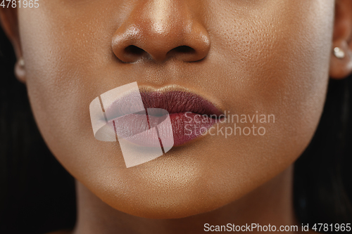 Image of African-american young woman\'s close up portrait