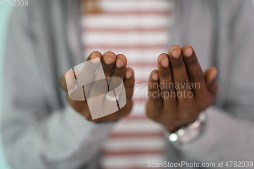 Image of Young African Muslim Man Making Traditional Fatiha Prayer To Allah