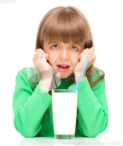 Image of Little girl with a glass of milk