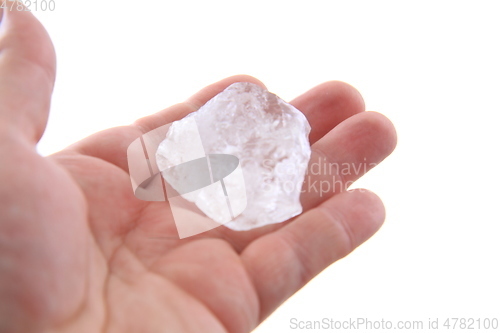 Image of crystal in the human hand