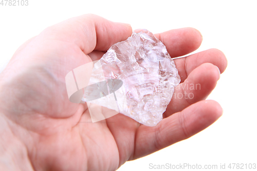 Image of crystal in the human hand