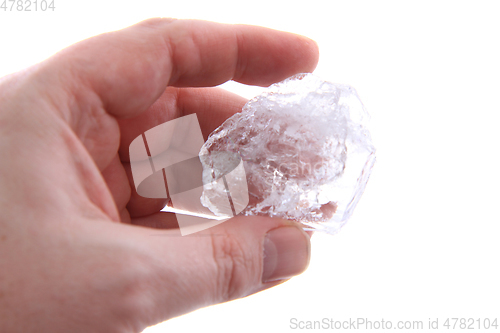 Image of crystal in the human hand