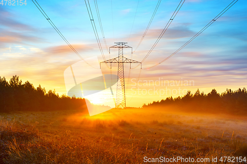 Image of Power lines and sunrise landscape 