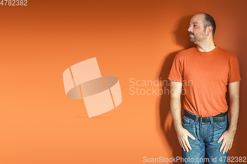 Image of man with beard orange