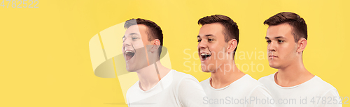 Image of Caucasian young man\'s close up portrait on yellow background