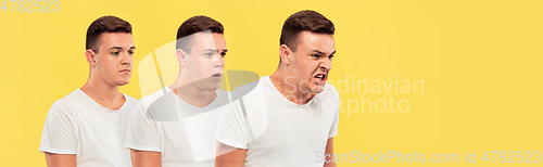 Image of Caucasian young man\'s close up portrait on yellow background