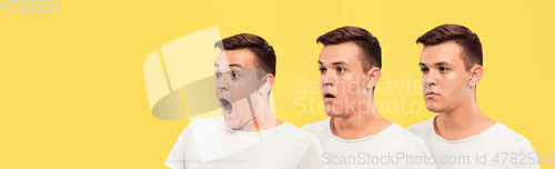 Image of Caucasian young man\'s close up portrait on yellow background