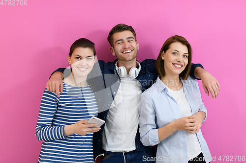 Image of group of friends have fun and dance while using a cell phone and headphones