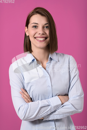 Image of Portrati shot of beautiful blond businesswoman standing with arms crossed at isolated white background.