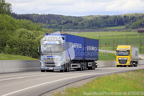 Image of Colorful Freight Transporters on Road