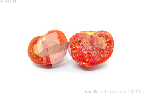 Image of Cut red tomato on a white background