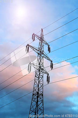 Image of High voltage tower against the evening sky