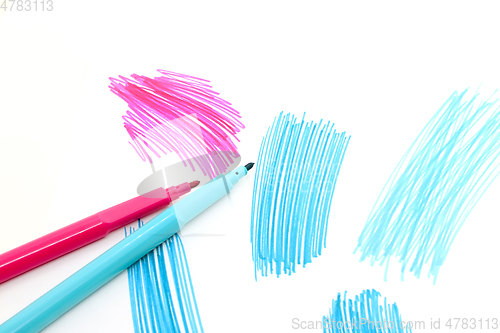 Image of Two felt-tip pens on a white background with abstract drawings