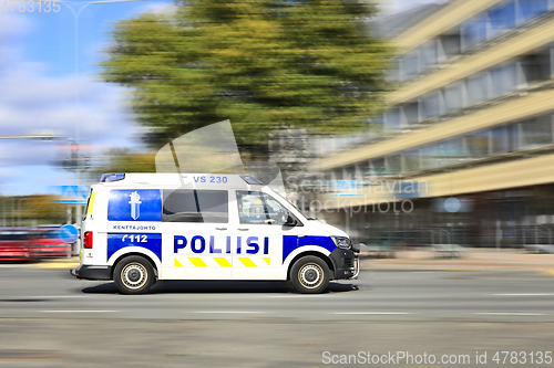 Image of Police Vehicle at Speed