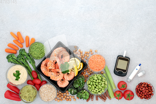 Image of Blood Sugar Testing Equipment and Food for Diabetics