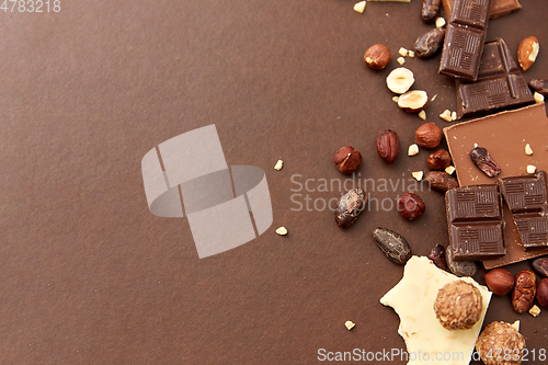 Image of chocolate bars with hazelnuts and cocoa beans