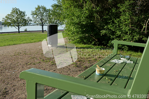 Image of Litter and Mess on Park Bench