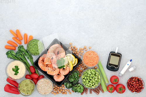 Image of Blood Sugar Testing Equipment and Food for Diabetics