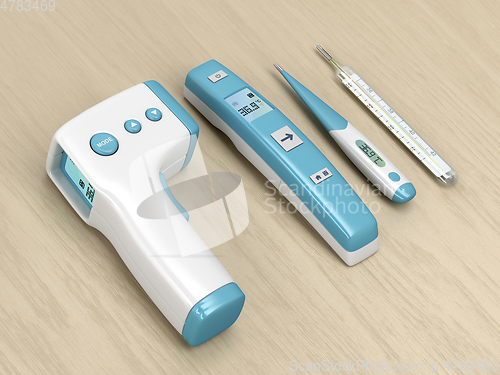 Image of Four different medical thermometers