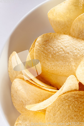 Image of typical crisps in a white bowl