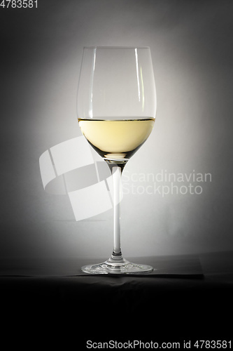 Image of white wine glass details
