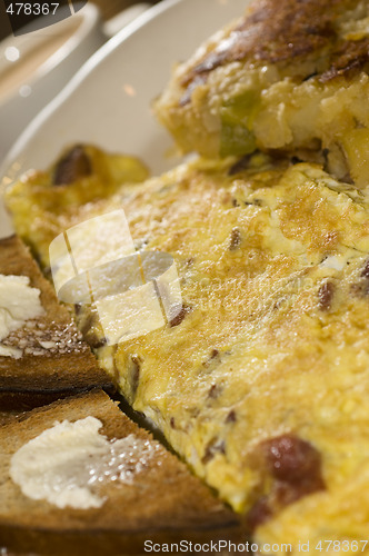 Image of egg omelette with home fries