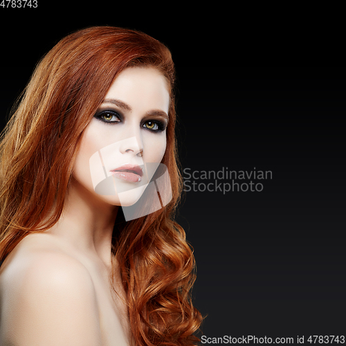 Image of girl with beautiful long red hair