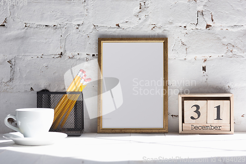 Image of Mock up blank picture or sheet on the brick wall background