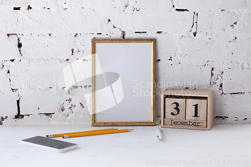 Image of Mock up blank picture or sheet on the brick wall background