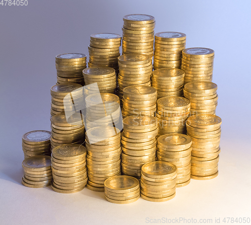 Image of lots of stacked euro coins