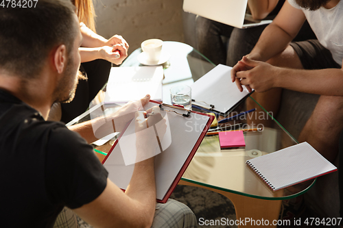 Image of Group of young caucasian office workers have creative meeting to discuss new ideas