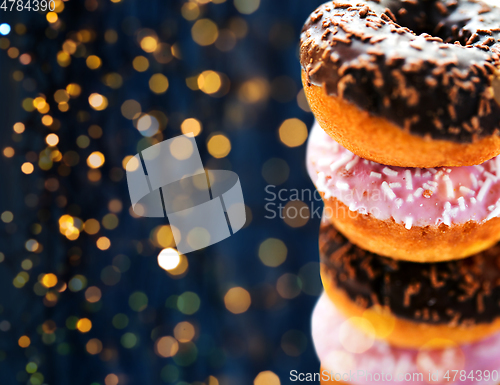 Image of close up of glazed donuts with sprinkles