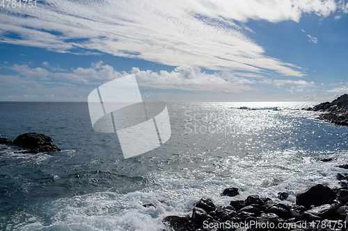 Image of beautiful wild beach with black sand