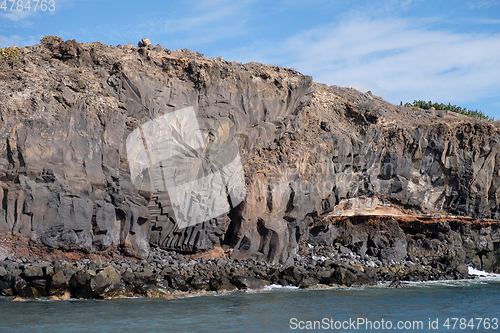 Image of beautiful wild beach with black sand