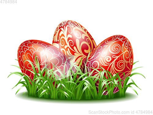 Image of Easter background with three red eggs in grass