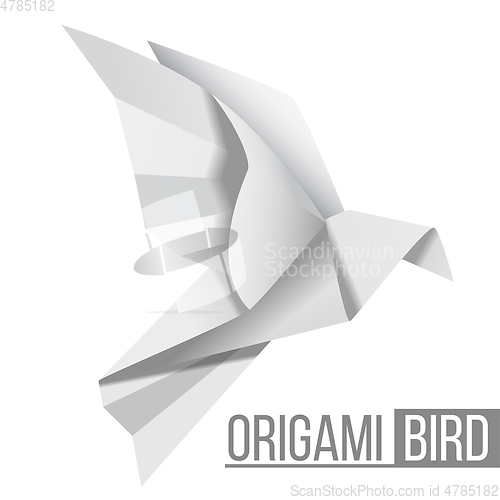 Image of Origami paper bird. Flying pigeon isolated on white