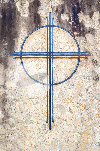 Image of cross at a grave stone