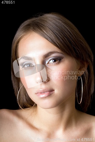 Image of Portrait of the young beauty woman. Isolated on black